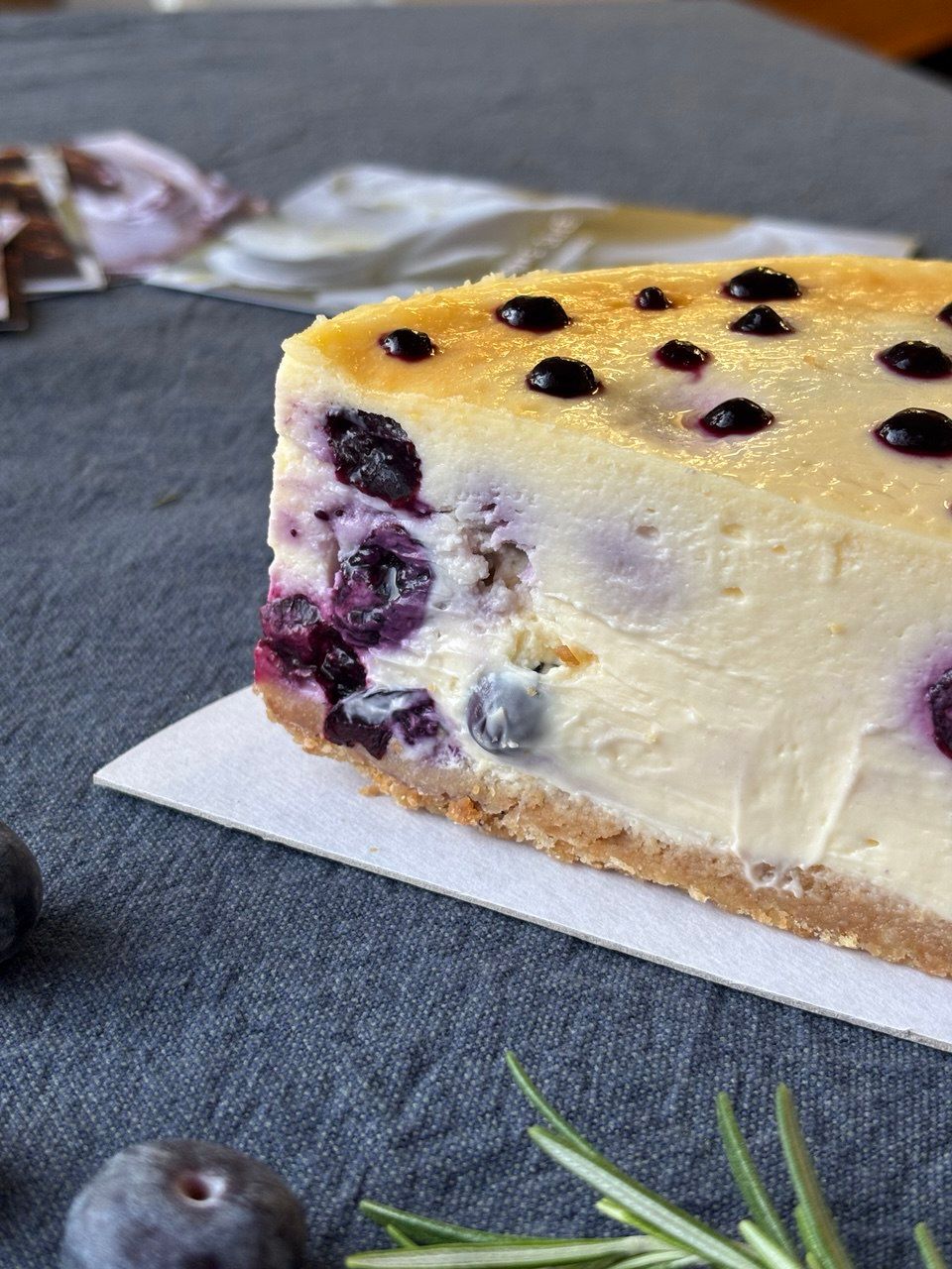 Blueberry cheesecake slice with rosemary